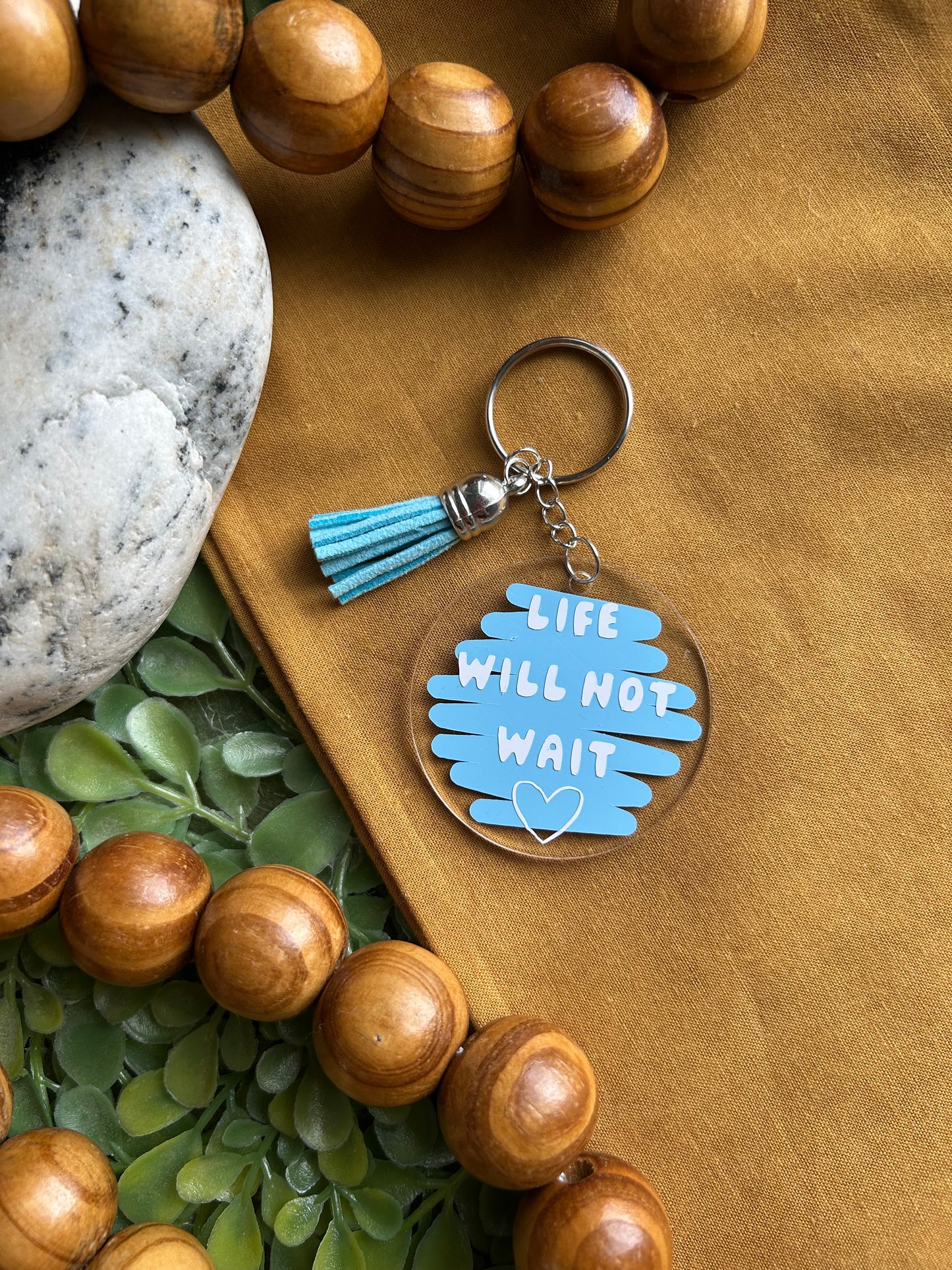 “Life will not wait” keychain